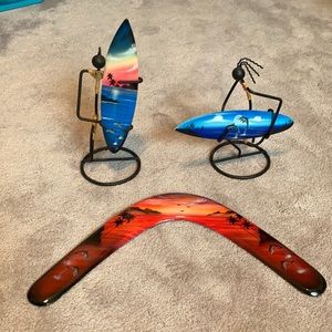 Surfer guys and boomerang with dolphins